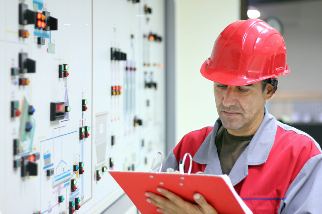 Operator in front of a switch board
